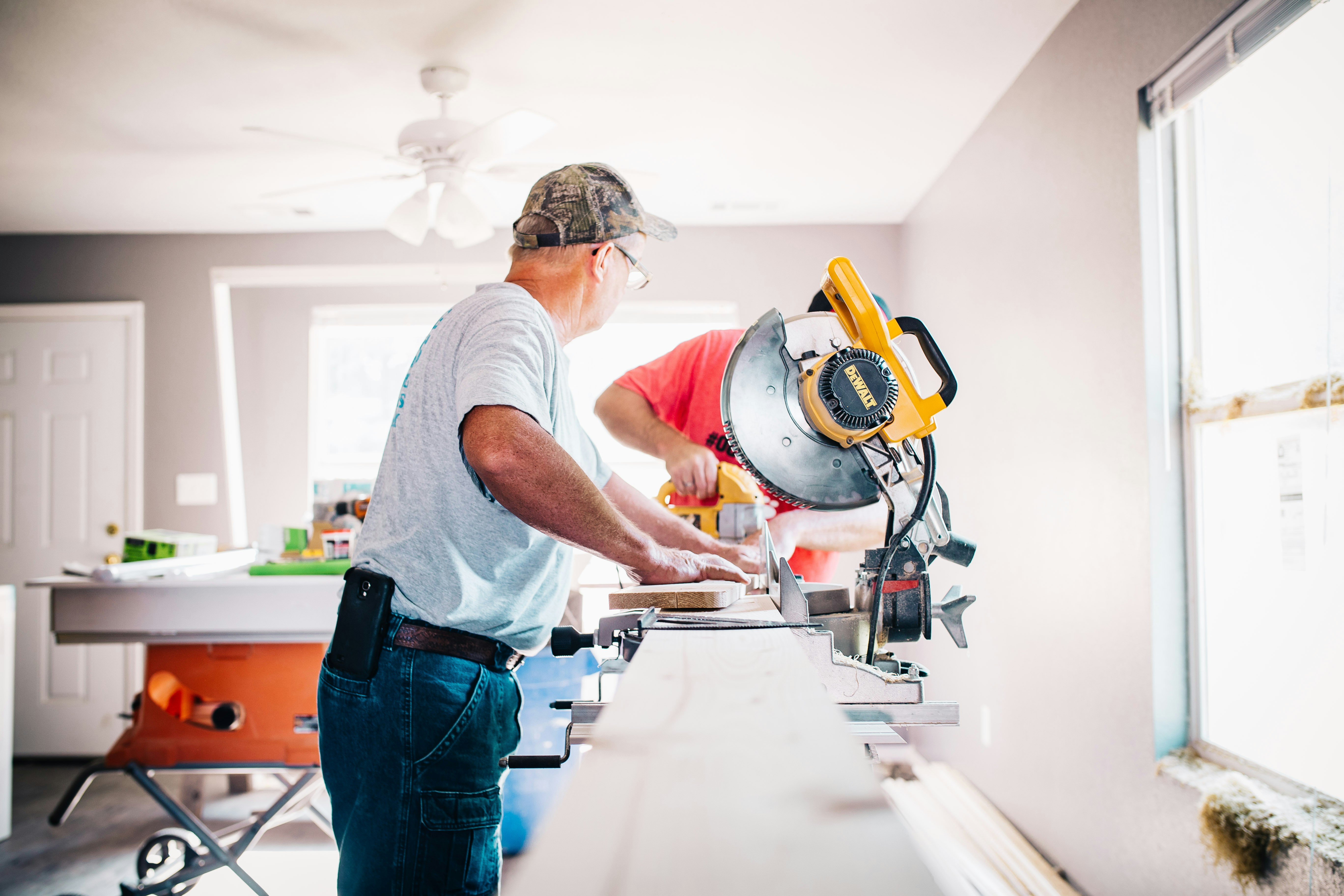 Home Renovation Workers Helping Each Other